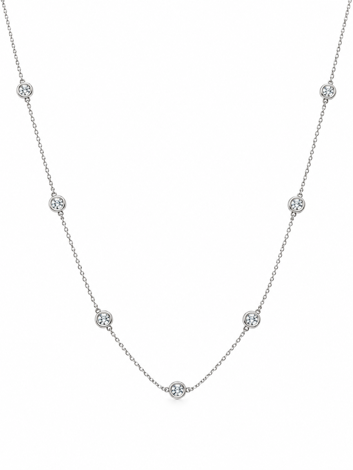 The Reserve Diamond Station Necklace laid flat, showing the full 14K white gold chain and diamond stations