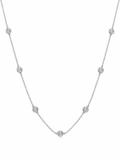 The Reserve Diamond Station Necklace laid flat, showing the full 14K white gold chain and diamond stations