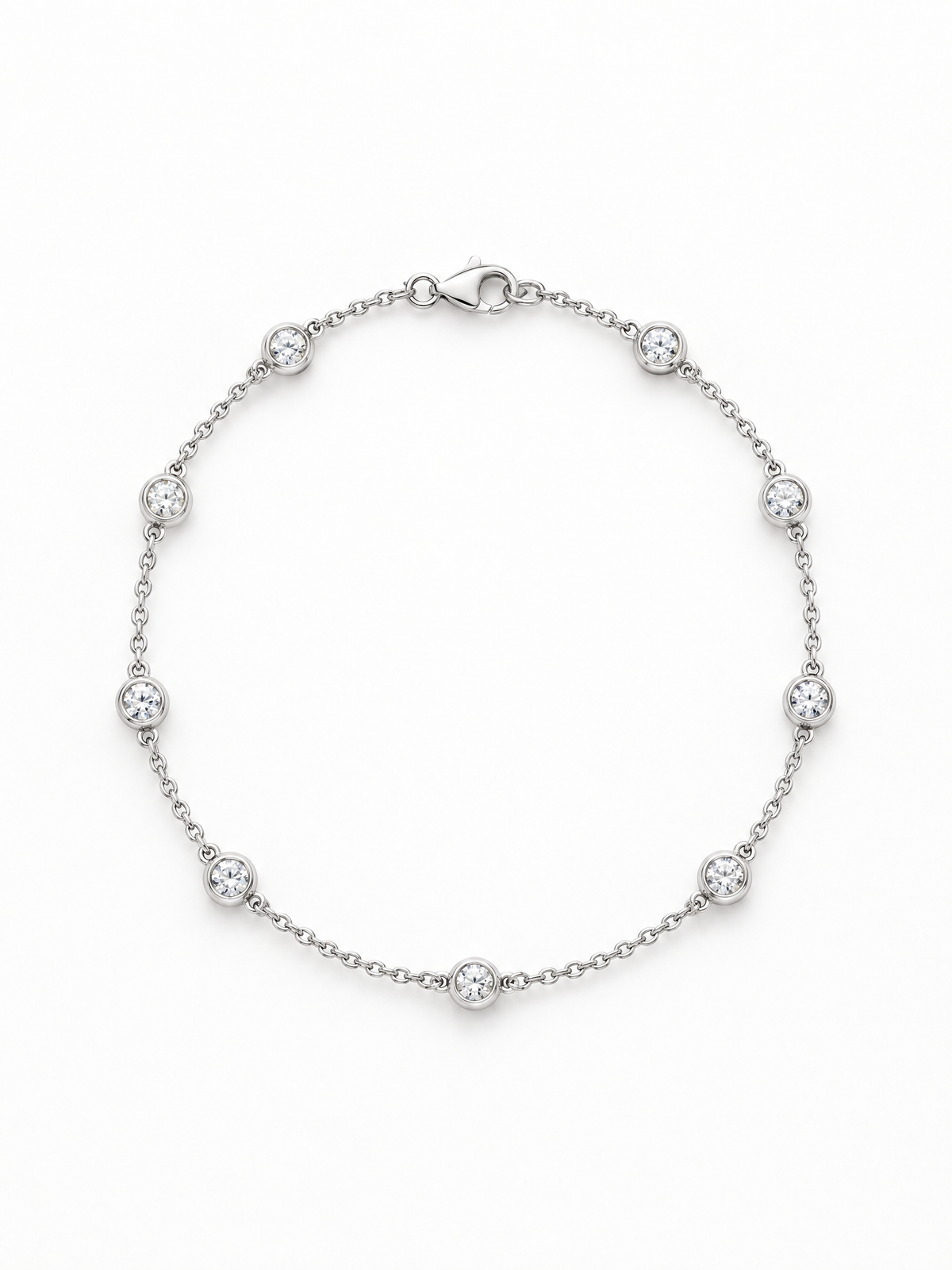 Reserve Diamond Station Bracelet in 14K white gold, bezel-set diamonds spaced along a fine cable chain with a lobster clasp
