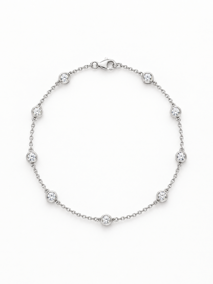 Reserve Diamond Station Bracelet in 14K white gold, bezel-set diamonds spaced along a fine cable chain with a lobster clasp